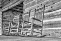 Wood rocking chairs sit idle on a porch Royalty Free Stock Photo