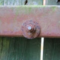 Wood rusty iron lock texture of old, vintage, rain and wind, weathered wood taken in the nature