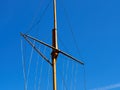 Wood sail mast and ropes of a boat Royalty Free Stock Photo