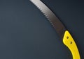 Wood saw blade of handsaw with yellow handle