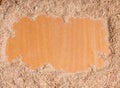 Wood sawdust on wooden background with free copy space. Empty space for text with sawdust.