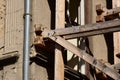 Wood scaffolding joint and bolted connection closeup. textured wood beams Royalty Free Stock Photo