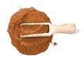 Wood scoop on pile of cinnamon powder on white Royalty Free Stock Photo