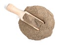 Wood scoop on pile of ground black pepper on white Royalty Free Stock Photo