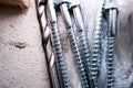 Wood screws with hex head and drill bit for metal close-up Royalty Free Stock Photo