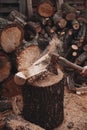 Wood shatters into pieces after ax chop