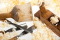 Chisels plane and mallet with wood shavings Royalty Free Stock Photo