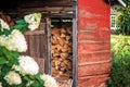Wood shed stocked and ready for winter at a farm house Royalty Free Stock Photo