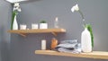 A wood shelve decor in bathroom or in spa center