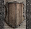 Wood shield on medieval castle gate 3d illustration Royalty Free Stock Photo