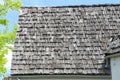 Wood shingle roof in poor state of repair Royalty Free Stock Photo