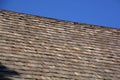 Wood shingles on a roof top of an old hut in bavaria, wood shingle roof renovated Royalty Free Stock Photo