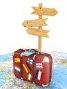 Wood sign board and old suitcase with striples flags on blurred world map Royalty Free Stock Photo