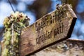 Wood sign with engraved words, 'Spean Bridge circular path' in a rustic font Royalty Free Stock Photo