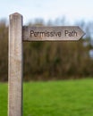 Wood sign marking the permissive path Royalty Free Stock Photo