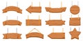 Wood signboards hanging on rope. Wooden blank banners and arrow signs. Round and star shaped board on chain. Old rustic signboard Royalty Free Stock Photo