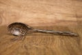Wood spoon on wood background dark brown. Royalty Free Stock Photo