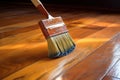 wood stain and brush for refinishing repaired floor section
