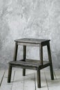 Wood stair-chair in modern loft room. grunge wall and wooden floor Royalty Free Stock Photo