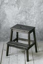 Wood stair-chair in modern loft room. grunge wall and wooden floor