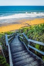 Wood stairs going to the sea in Bells Beach, on the Great Ocean Road Royalty Free Stock Photo