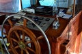 Wood steering wheel of a cruise ship. Close-up Royalty Free Stock Photo