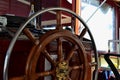 Wood steering wheel of a cruise ship. Close-up Royalty Free Stock Photo