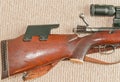 Wood stock, open, bolt action, sporterized, mauser rifle, with a black cheek riser