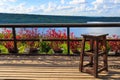 Wood stool on balcony in lake Royalty Free Stock Photo