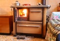 wood stove of the economical kitchen inside a mountain house