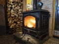 Wood stove with a woodshed