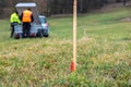 Wood survey stake painted in red for work on construction site