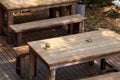 Wood table and bench with sunlight. Royalty Free Stock Photo