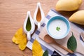 Wood table with fresh yogurt and mangoes juice