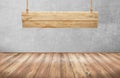 Wood table with hanging wooden sign Royalty Free Stock Photo