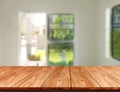 Wood table in modern home room decoration.