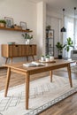 Wood table in modern home room interior with empty copy space on the table for product display mockup Royalty Free Stock Photo
