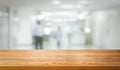 Wood table in modern hospital building interior. Royalty Free Stock Photo