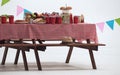 Wood table and red napkin cover for outdoor party Royalty Free Stock Photo