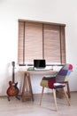 Wood table set in working space.