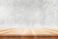 Wood table top on bare concrete wall background - can be used for display or montage your products Royalty Free Stock Photo