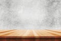 Wood table top on bare concrete wall background - can be used for display or montage your products Royalty Free Stock Photo