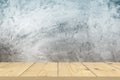 Wood table top on bare concrete wall background Royalty Free Stock Photo