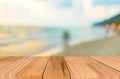 Wood table top on blue sea & sky background can put or montage y Royalty Free Stock Photo