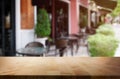 Wood table top on blur background of coffee shop & x28;or restaurant& x29; Royalty Free Stock Photo