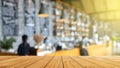 Wood table top on blur coffee shop background. For montage product display or design key visual layout Royalty Free Stock Photo