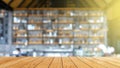 Wood table top on blur coffee shop background. For montage product display or design key visual layout Royalty Free Stock Photo