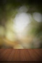 Wood table top on blur green background - can be used for display or montage your products Royalty Free Stock Photo