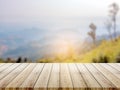 Wood table top on blur hill mountain a sunrise nature background Royalty Free Stock Photo