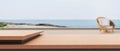 Wood table top and blur Holidays Sea - Sky background with beach chairs .panoramic banner - can be used for display Royalty Free Stock Photo